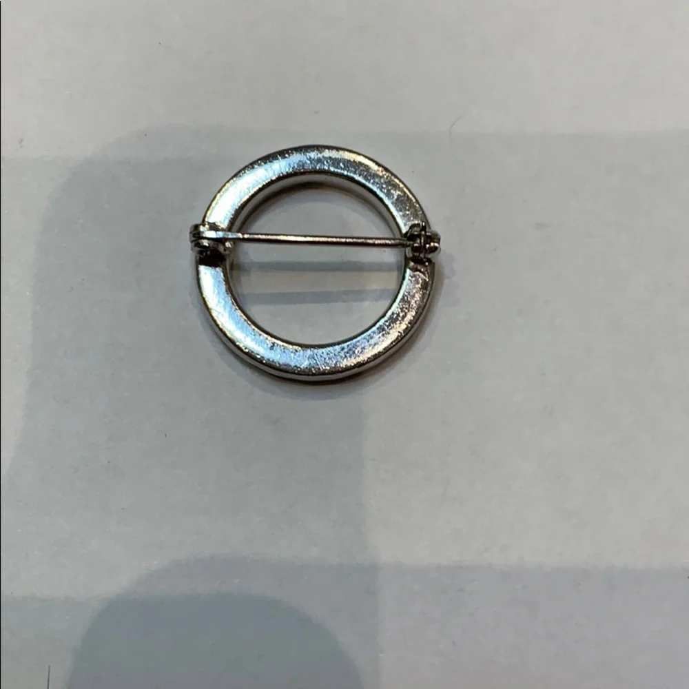 Vintage silver round rhinestone brooch